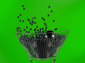 This is a picture of ball bearings splashing into a glass full of bearings.