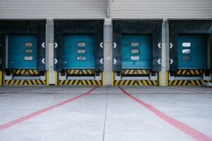 The picture shows docking bays at a warehouse which relates to our authorized distributor status.